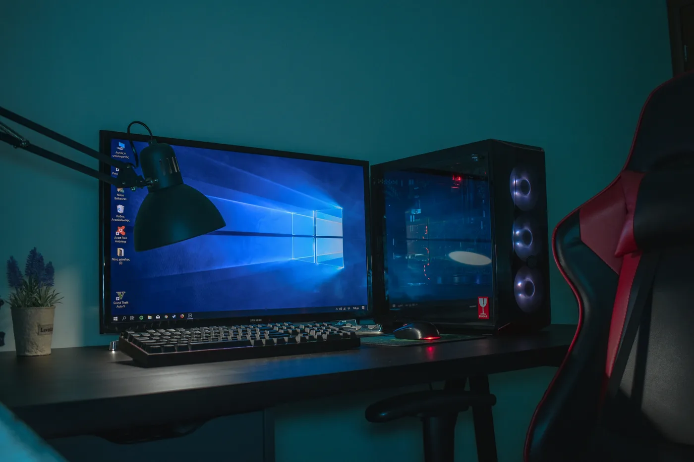 Desktop computer setup with monitors and a custom PC